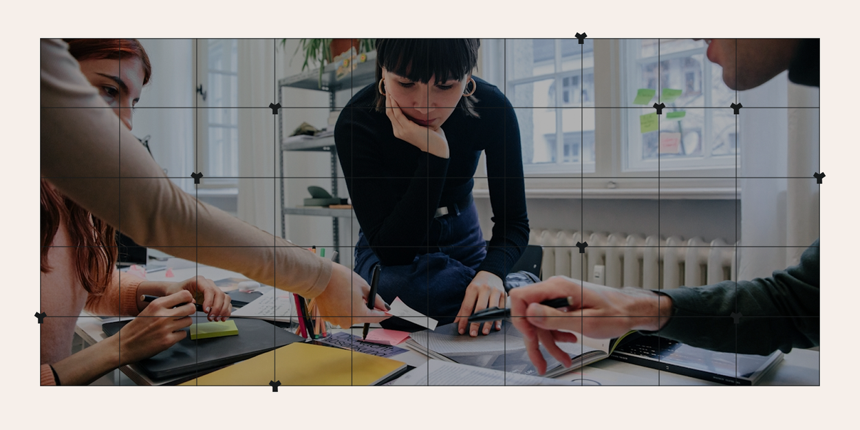 Designed graphic of 3 people looking at a blueprint on a table