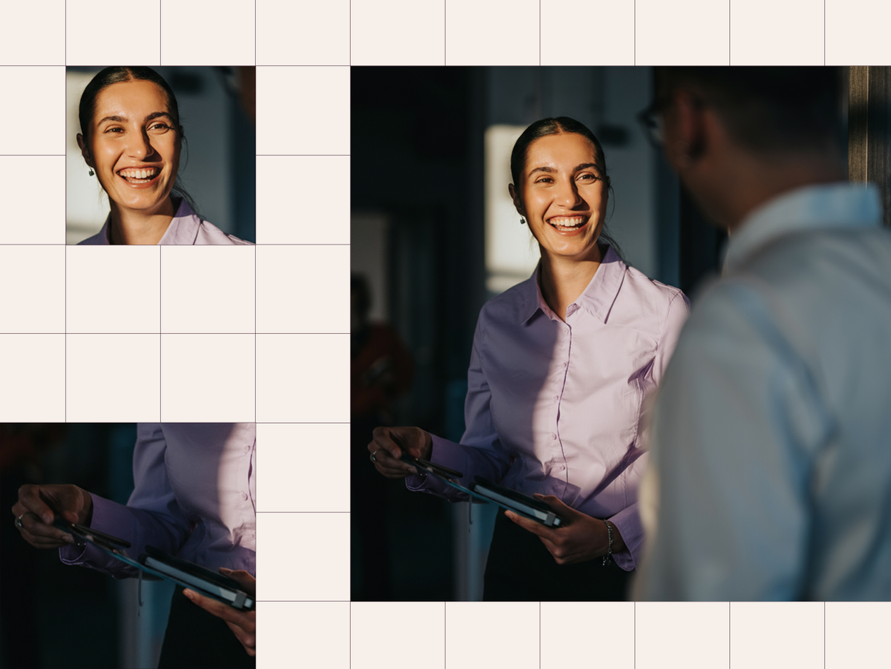 smiling lady in business casual speaking to coworker